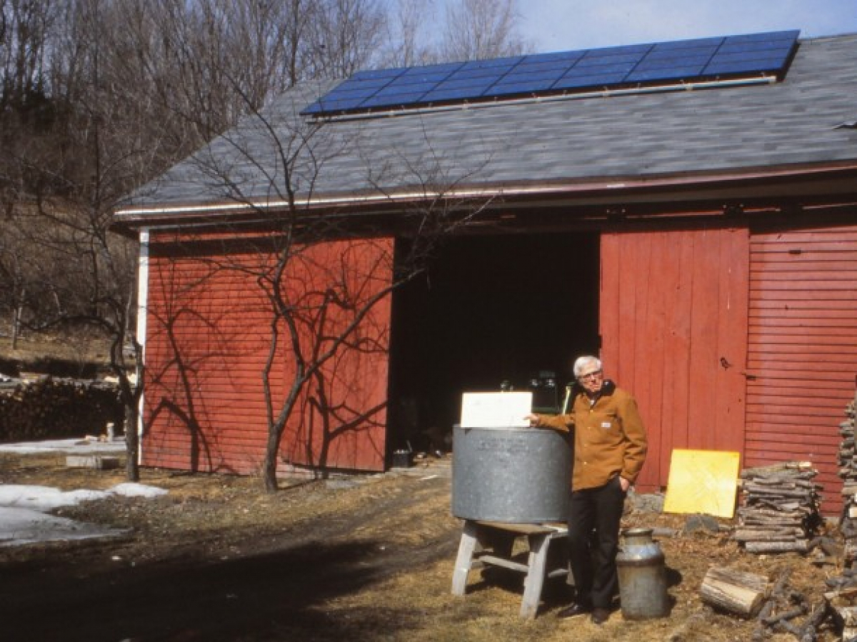 Noel Perrin shows off his solar array, the first in Vermont to be connected to the grid, in March 1991